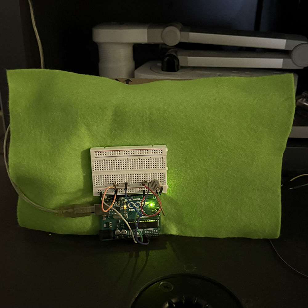 This is how it looks like when a user sits on a chair and covering the light sensor.